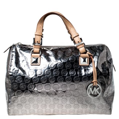 Michael Kors silver handbags